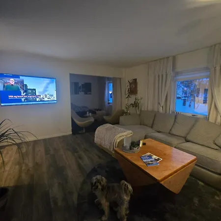 Modern House In Front Of Midnight Sun