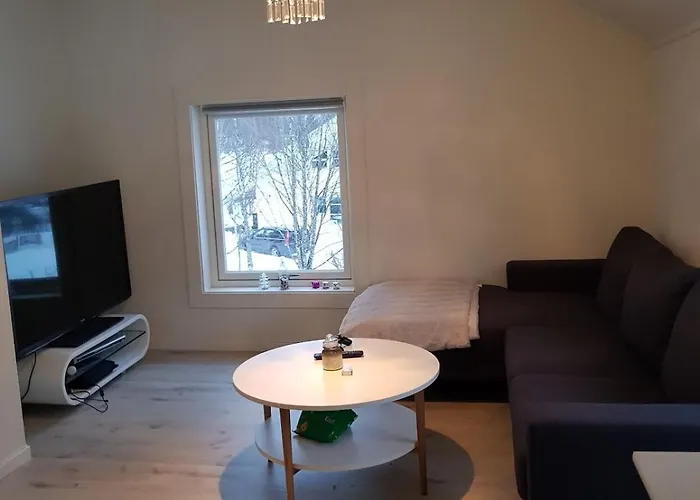 Modern House In Front Of Midnight Sun Lavangen