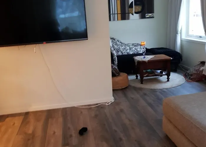 Modern House In Front Of Midnight Sun Lavangen