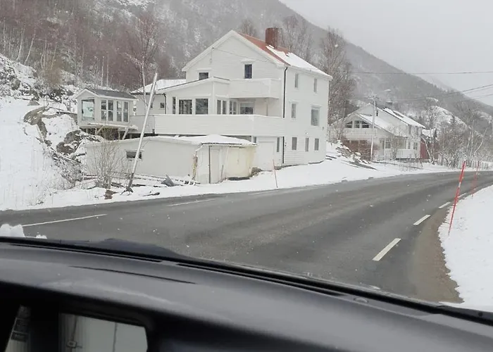 Modern House In Front Of Midnight Sun Lavangen