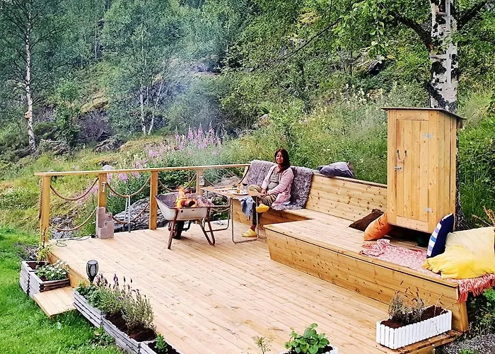 Modern House In Front Of Midnight Sun Lavangen