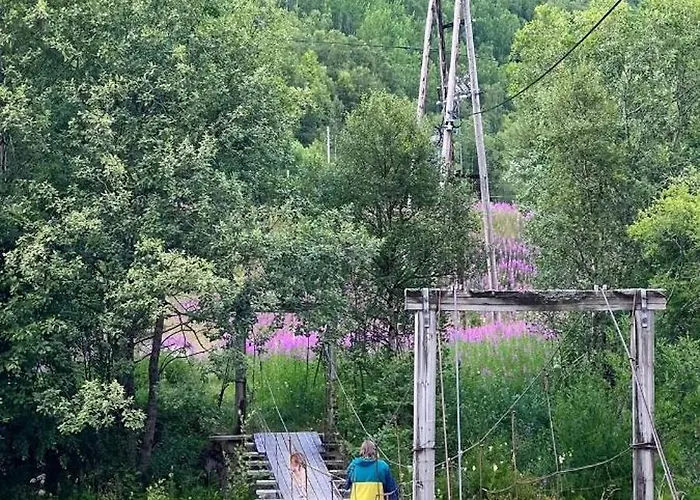 Modern House In Front Of Midnight Sun