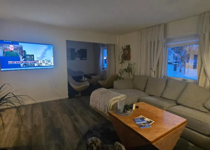 Modern House In Front Of Midnight Sun