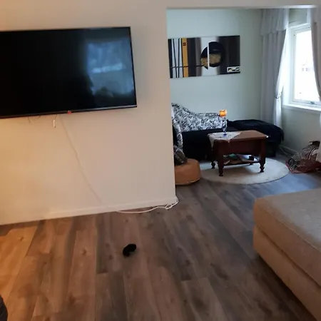 Modern House In Front Of Midnight Sun Lavangen