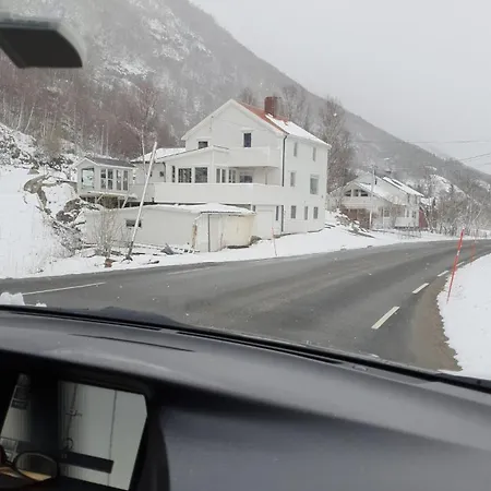 Modern House In Front Of Midnight Sun Lavangen