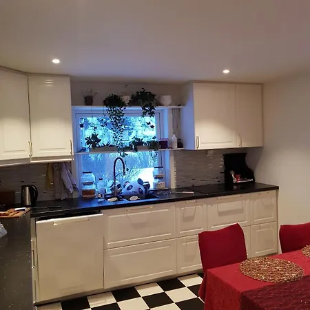 Modern House In Front Of Midnight Sun *