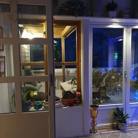 Modern House In Front Of Midnight Sun