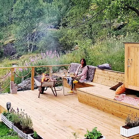 Modern House In Front Of Midnight Sun Lavangen