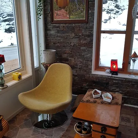 Modern House In Front Of Midnight Sun